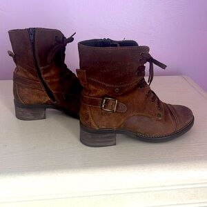 Brown Taos Crave boots with zippers for easy on and off. Worn only a few timea